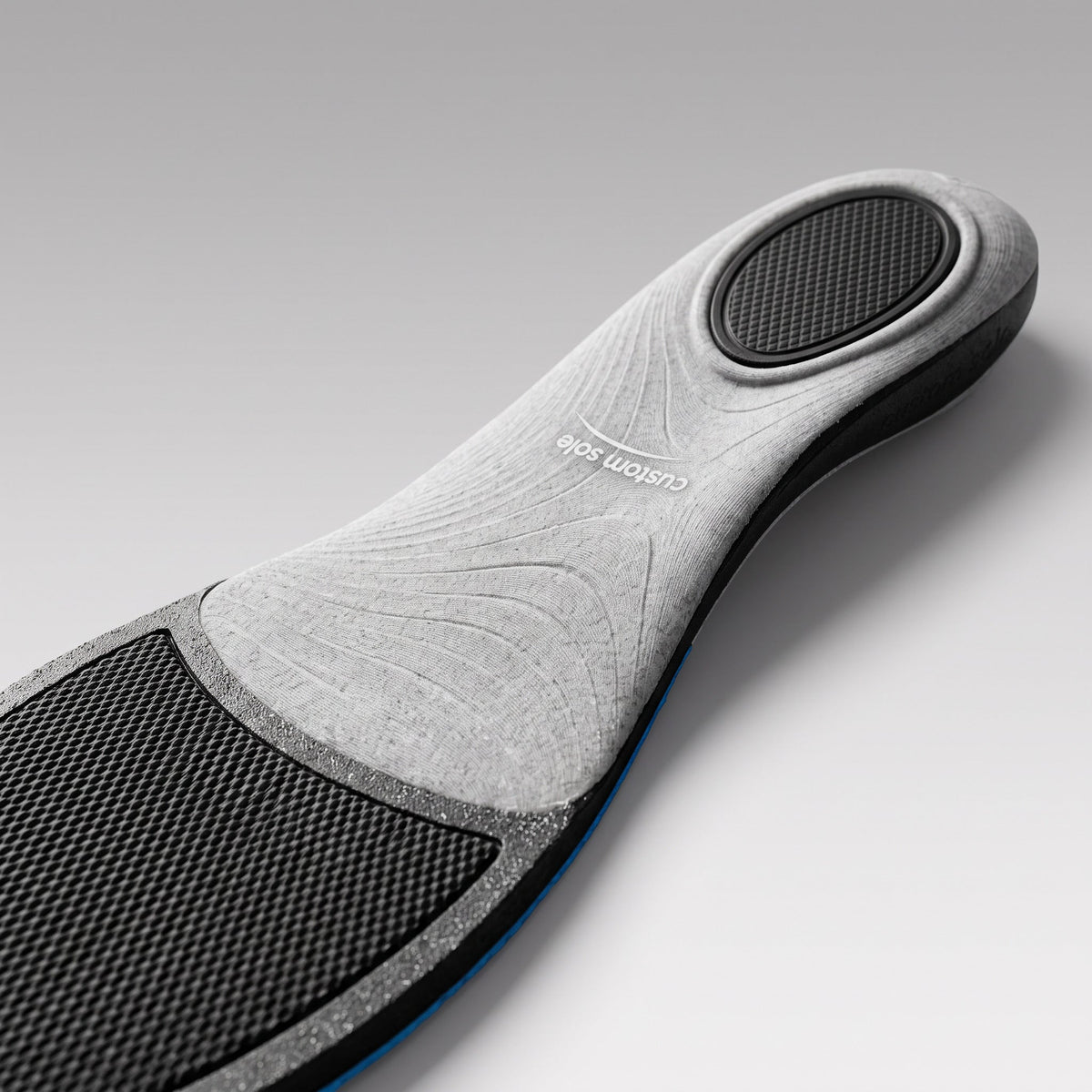 Printed arch shell on the underside of a Lagoon custom insole