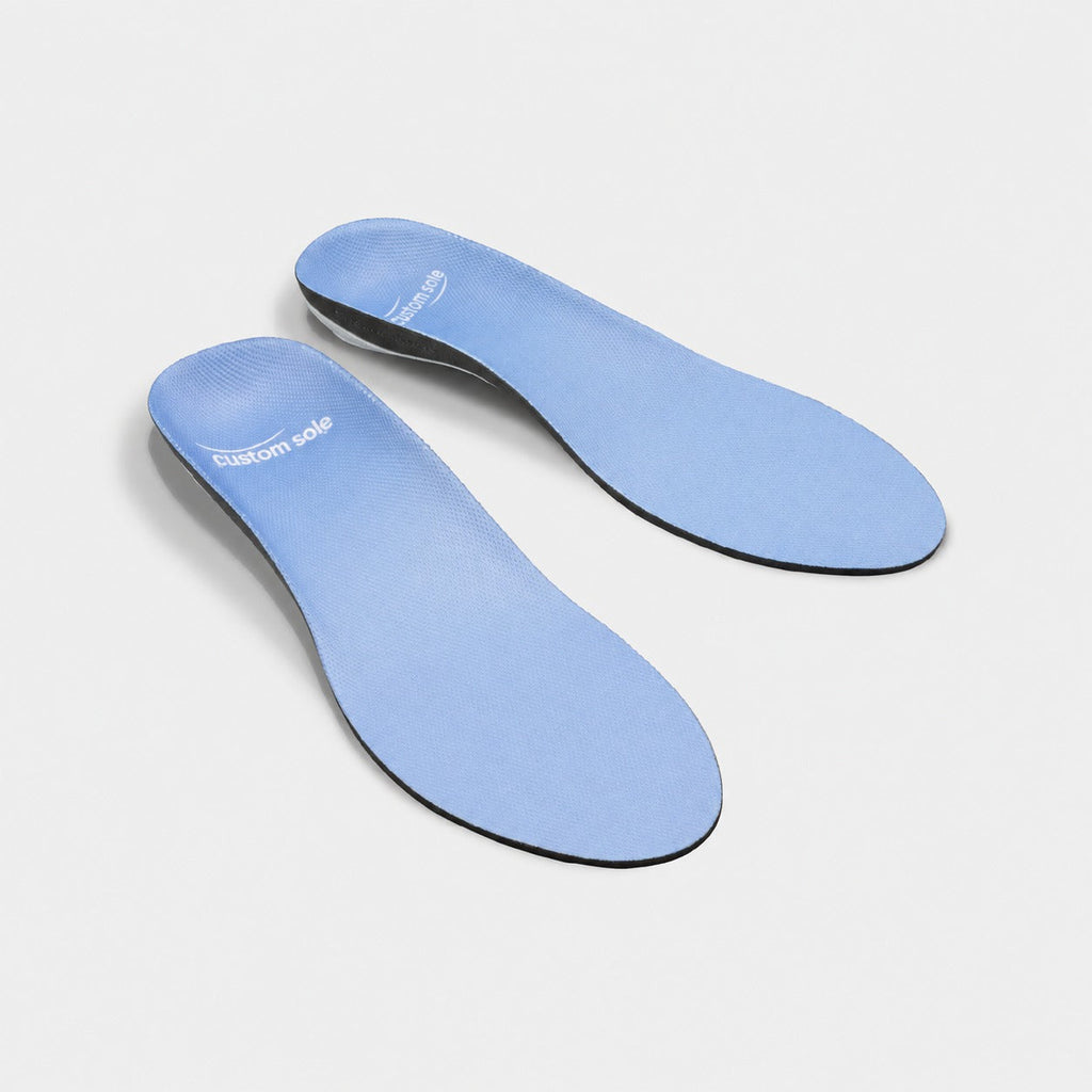 Morning Mist custom insoles shown at an angle to reveal the contoured arch and deep heel cup
