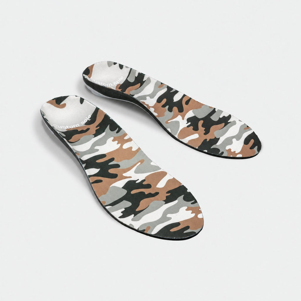 Outpost custom insoles shown at an angle to reveal the contoured arch and deep heel cup