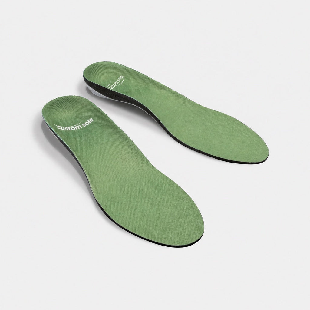 Sagebrush custom insoles shown at an angle to reveal the contoured arch and deep heel cup